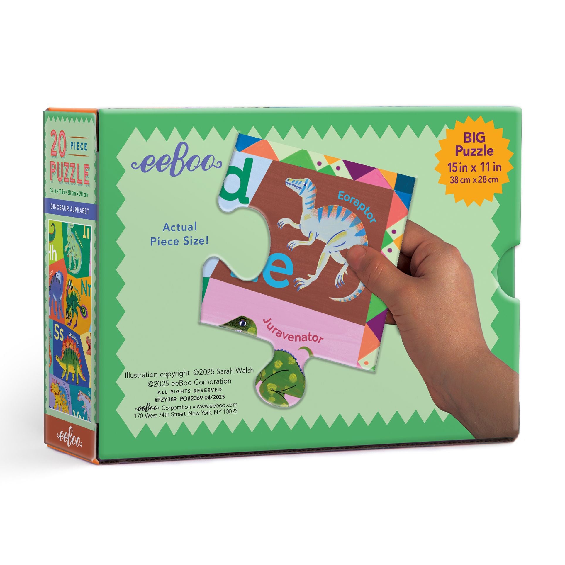 dinosaur-themed puzzle box with a hand holding a piece. Dinosaur Alphabet 20 Piece Puzzle by eeBoo | Unique Fun Gifts