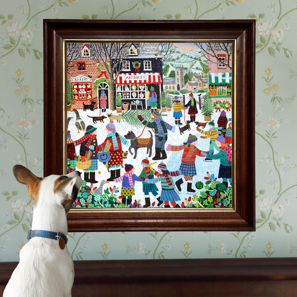 Jigsaw puzzle  with a colorful illustration of a Christmas scene in a town square.