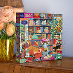 Illustrator Victoria Ball depicts a cozy, eclectic library full of patterns, plants, cats, & bric-a-brac.  1000 Piece Jigsaw Puzzle by eeBoo