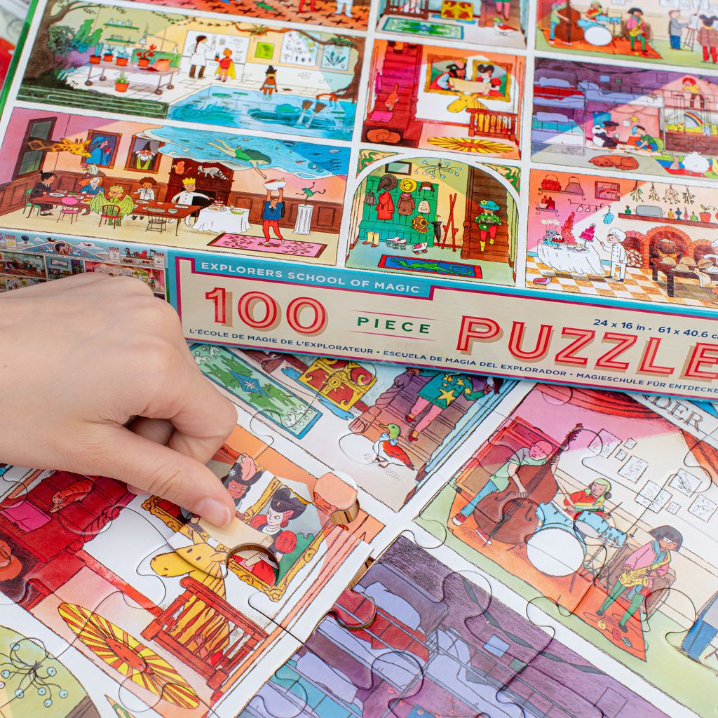 Puzzle box with colorful illustrations of a school setting. Explorers School of Magic 100 Piece Puzzle