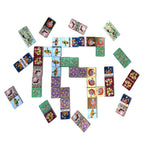 This Cottage Fairy Giant Dominoes set includes 28 oversized domino pieces, each featuring enchanted forest details illustrated by Gemma Koomen & finished with shiny gold foil. 