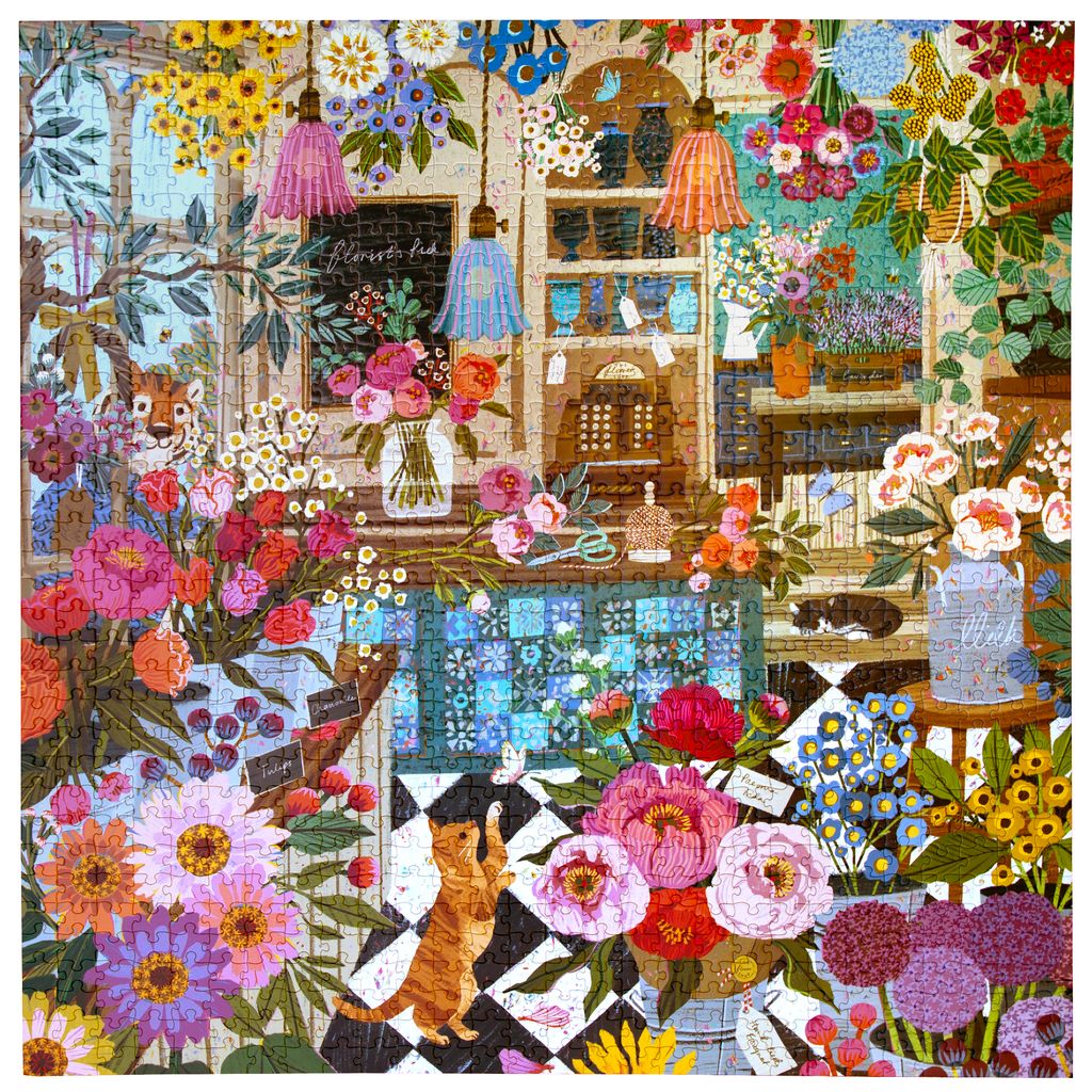 Colorful puzzle with floral patterns and a cat in a store setting