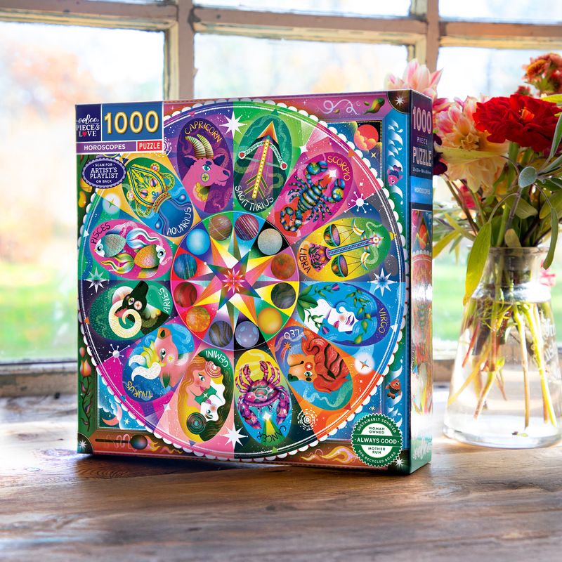Colorful Horoscope puzzle box on a wooden surface. Horoscopes_1000_Piece_Puzzle