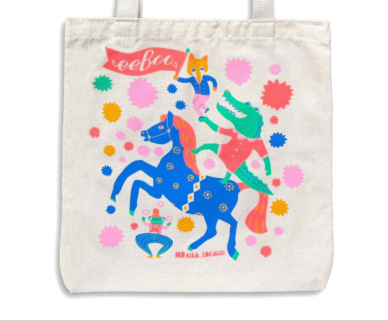 Tote bag with colorful design of a character riding a unicorn on a white background