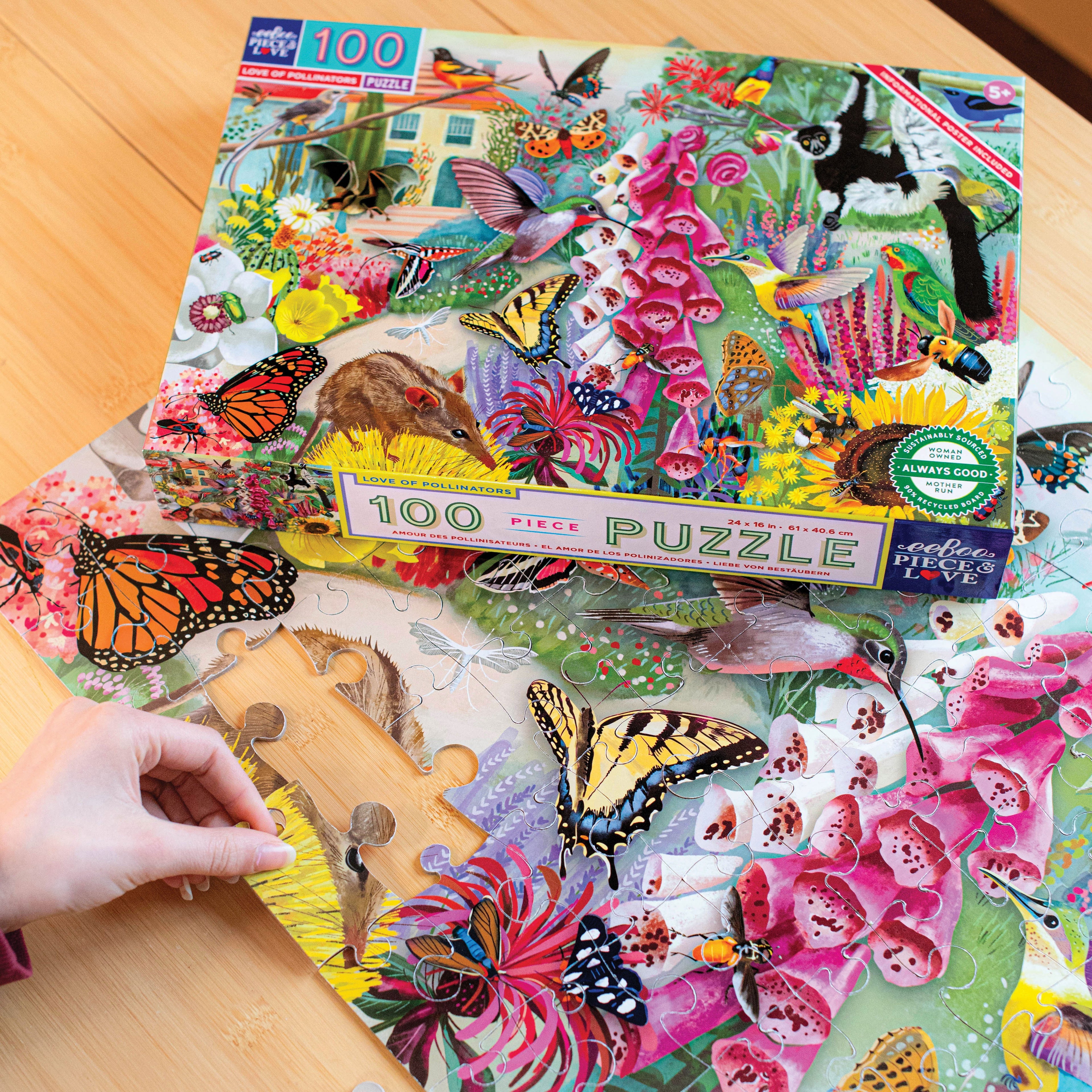 Jigsaw puzzle box featuring a colorful illustration of pollinators and flowers. 100 piece jigsaw puzzle by eeBoo