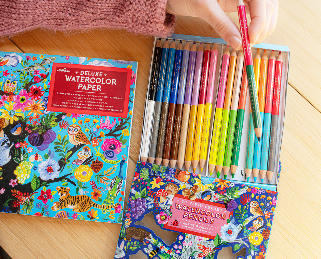Pack of watercolor pencils with colorful packaging featuring animals and nature by eeBoo