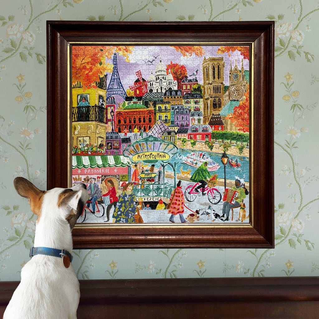 Artist Jennifer Orkin Lewis depicts a collection of Parisian landmarks offering a tour of the city of lights in crisp fall light. 1000 Piece Jigsaw Puzzle by eeBoo 