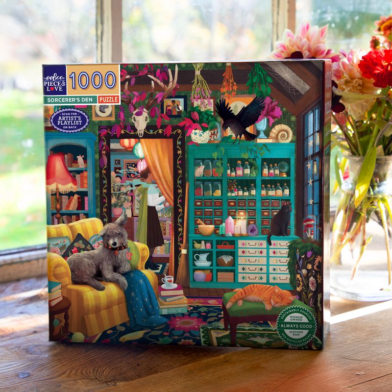 Jigsaw puzzle box with a colorful interior scene featuring books, a cat, and a dog on a yellow chair.
