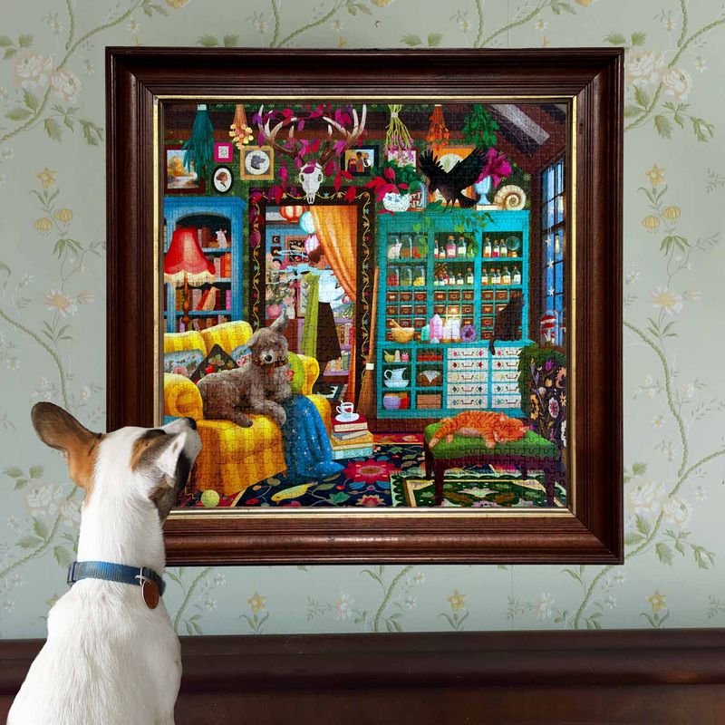 Dog looking at a framed painting of a colorful interior scene with books and furniture.