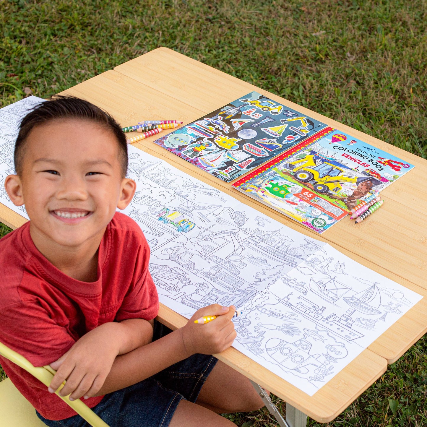 Coloring book titled 'Vehicles' with illustrations of a bulldozer, airplane, and other vehicles. Vehicles Fold-Out Coloring Book