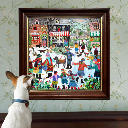 Jigsaw puzzle  with a colorful illustration of a Christmas scene in a town square.