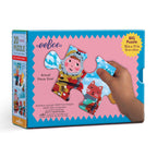 eeBoo puzzle packaging with a hand holding a piece. Yumi's Winter Carols 20 Piece Puzzle by eeBoo | Unique Fun Gifts