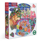 Round puzzle box with a colorful design of a dog looking at Christmas cookies through a window. Christmas Cookies 500 Round Puzzle by eeBoo | Unique Beautiful Gifts