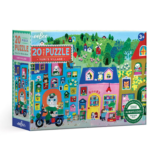 Puzzle box with colorful illustration of a village scene. Yumi's Village 20 Piece Puzzle by eeBoo | Unique Fun Gifts