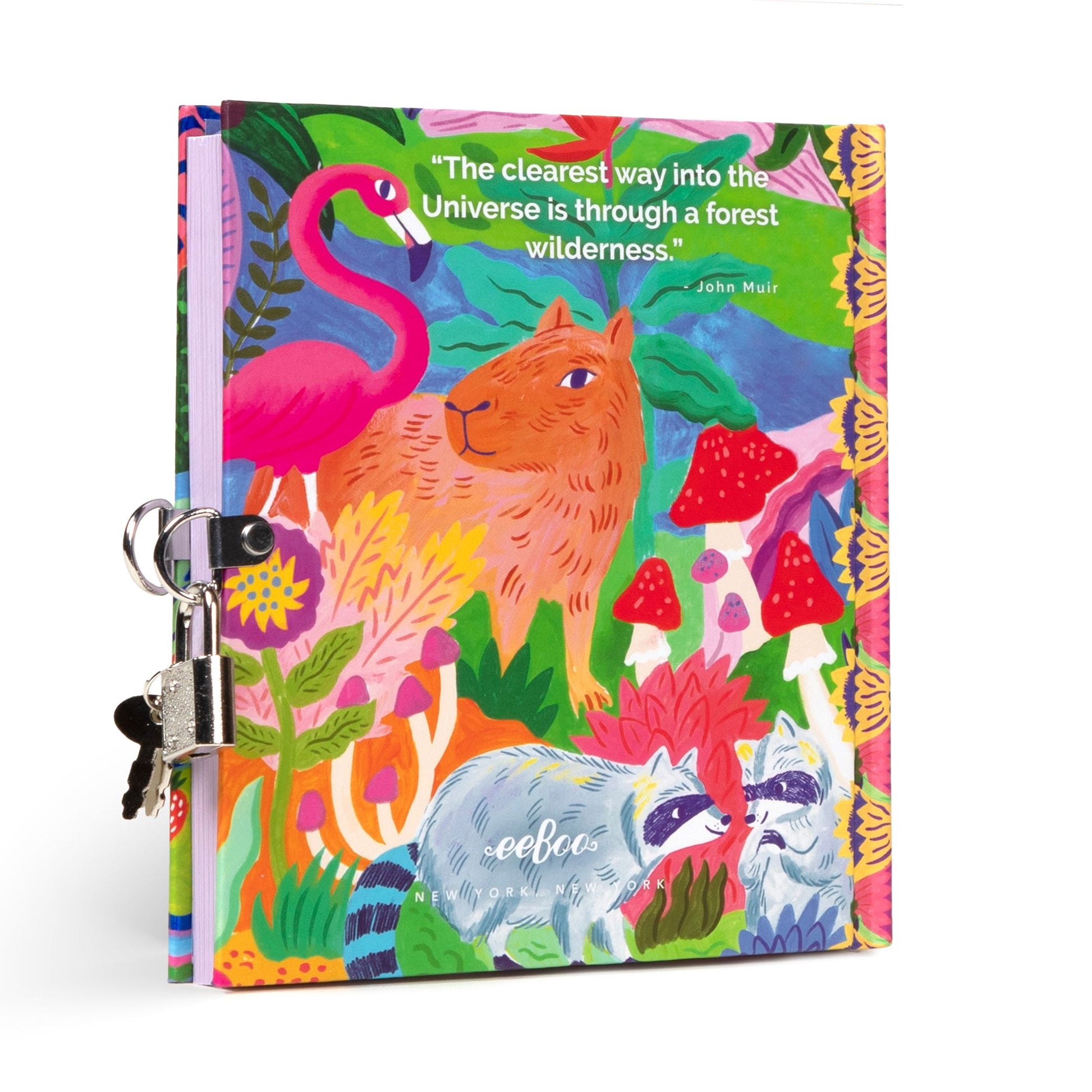 A colorful journal with a whimsical illustration of a deer, rabbit, and various plants with a lock and two keys attached to it.